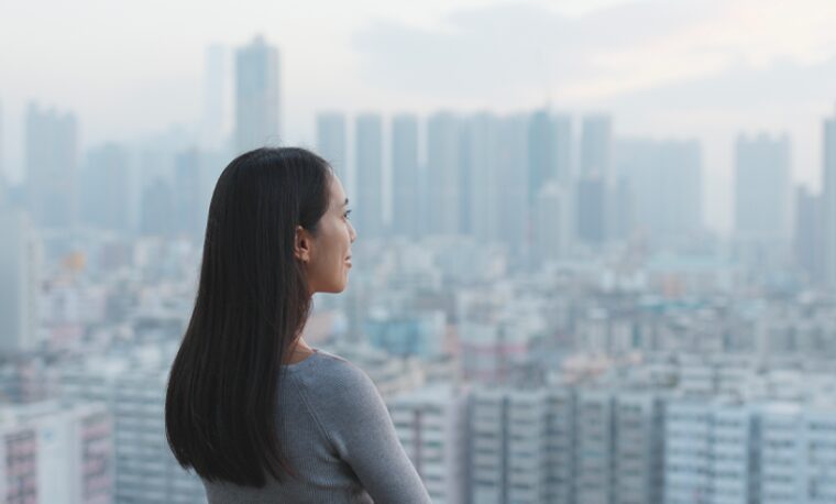 Confident Woman looking at the city view